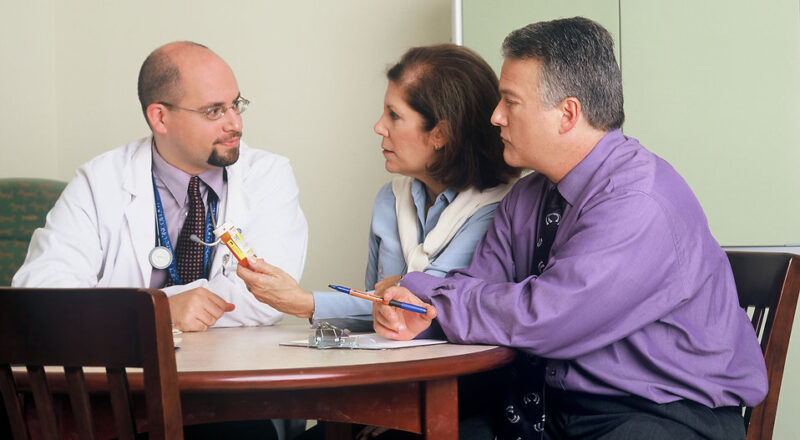 Patients consulting doctor