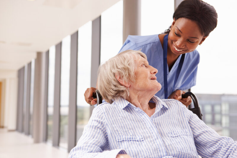 nurse with an elderly patient