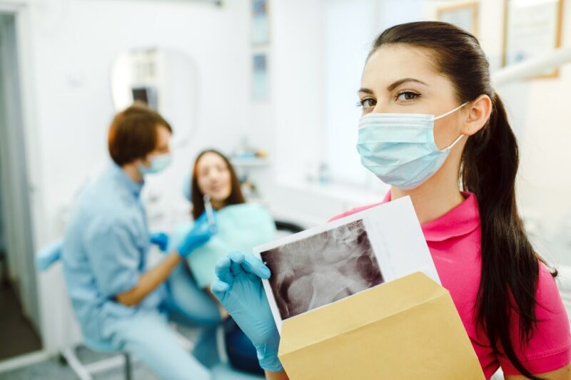 woman assistant in dental office