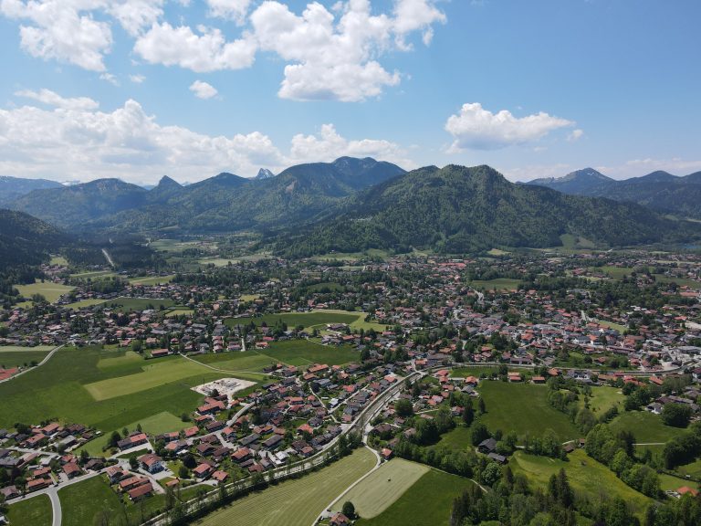 Aerial view of Tegernsee and the surrounding Bavarian Alps, an ideal setting for a quiet spa weekend.